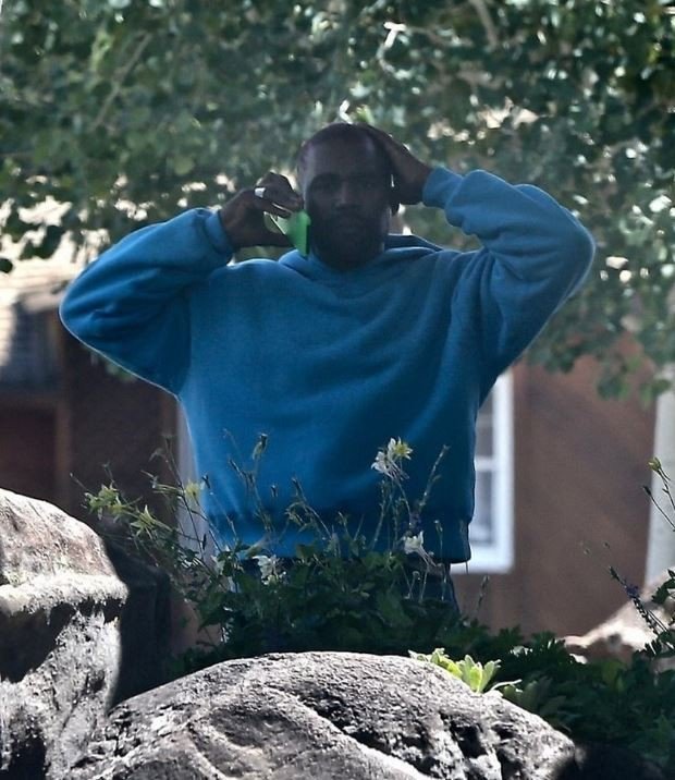 Kanye West in Blue Hoodie