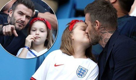 David Beckham kisses daughter Harper