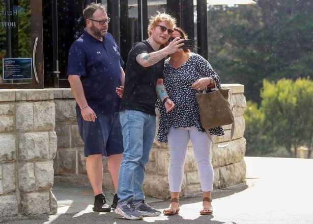 Ed Sheeran on a walk with his wife Cherry Seaborn and 7-month-old daughter Lyra