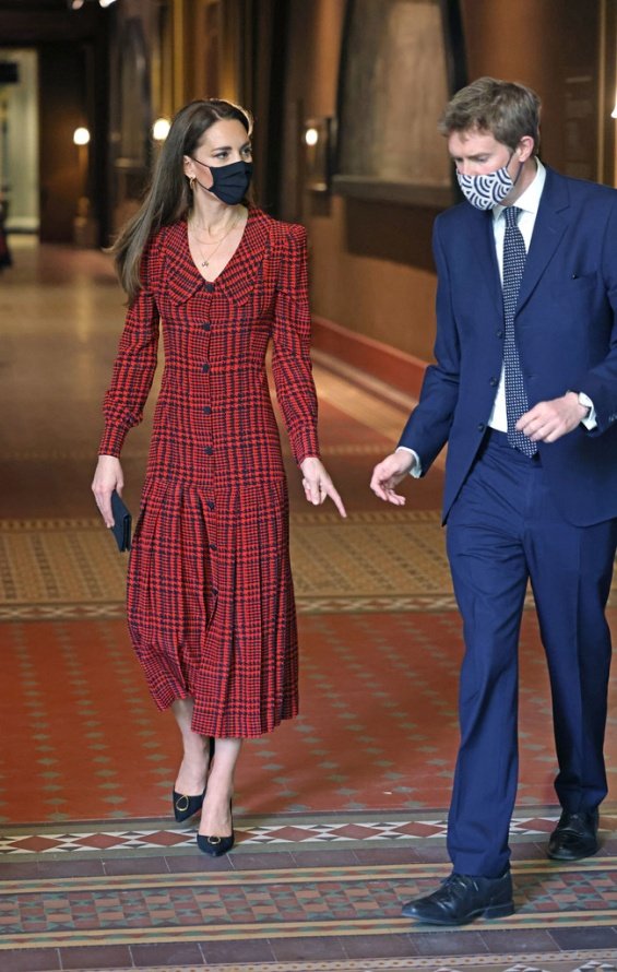 Kate Middleton in a plaid red dress for a visit to a museum in London