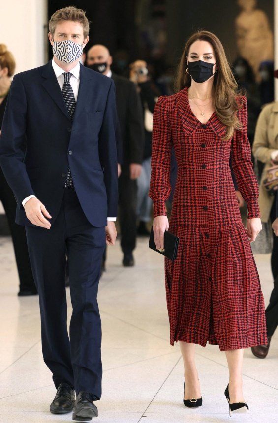 Kate Middleton in a plaid red dress for a visit to a museum in London