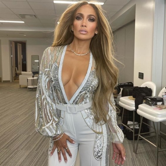 Jennifer Lopez in glamorous overalls by Elie Saab and Zuhair Murad at the "Vax Live" concert where she sang with her mother