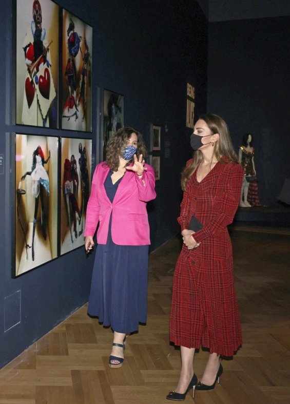 Kate Middleton in a plaid red dress for a visit to a museum in London