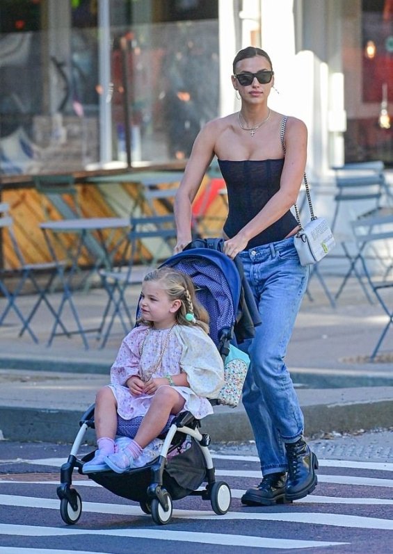 Urban chic: Irina Shayk in a sexy bodysuit and jeans with her daughter in New York