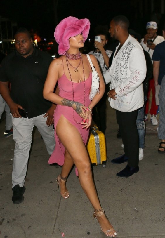 Rihanna in a see-through pink dress with a high slit for going out with boyfriend ASAP Rocky