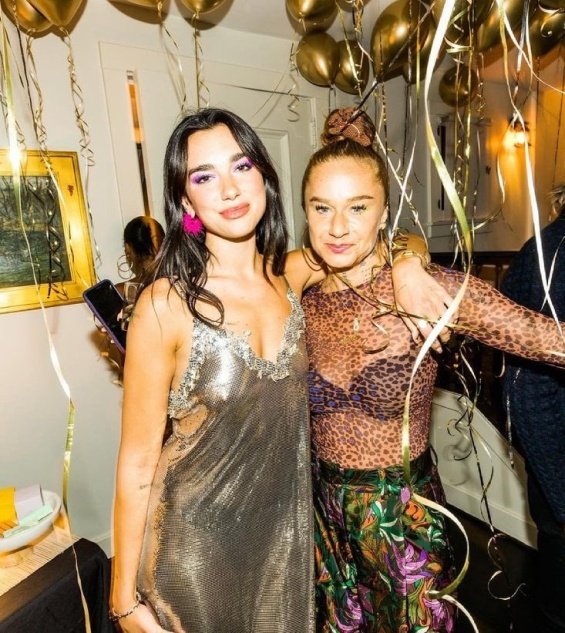 Dua Lipa in a Versace dress at the birthday party that surprised boyfriend Anwar Hadid