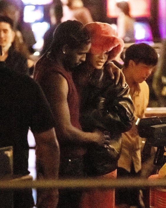 Rihanna in a see-through pink dress with a high slit for going out with boyfriend ASAP Rocky