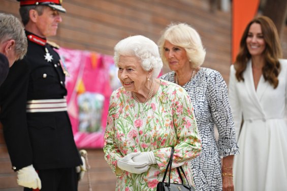 Duchess Catherine in a white coat and pearl bracelet from Princess Diana at the G7 summit