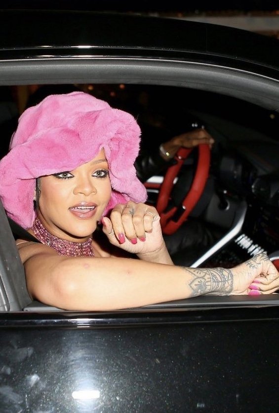 Rihanna in a see-through pink dress with a high slit for going out with boyfriend ASAP Rocky