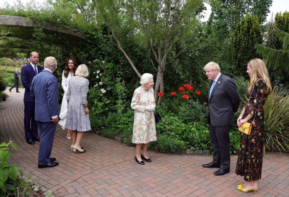 Duchess Catherine in a white coat and pearl bracelet from Princess Diana at the G7 summit