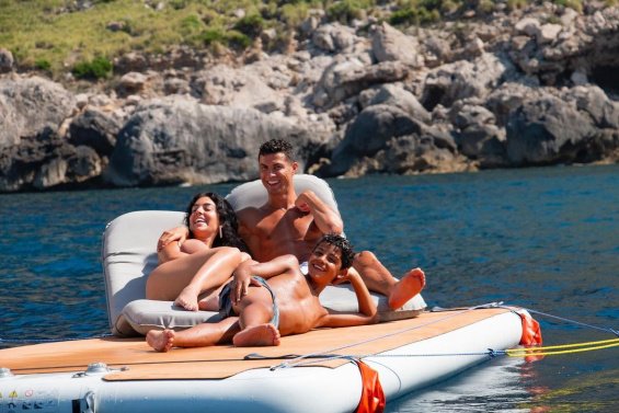 Cristiano Ronaldo and Georgina with their four children relax on a luxury yacht in Mallorca