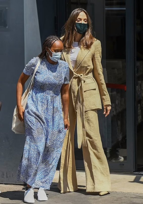 Angelina Jolie in several stylings with children in Paris