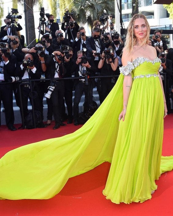 Charming blogger Chiara Ferragni in a light green dress on the red carpet in Cannes