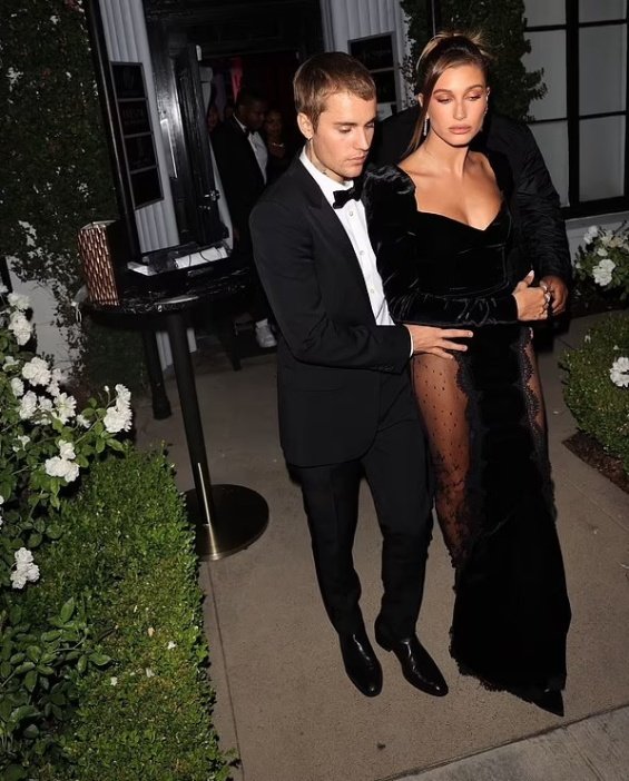 Justin and Hailey Bieber glamorous couple at a party in West Hollywood