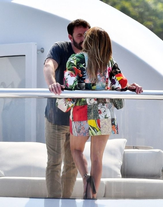 Jennifer Lopez celebrated her 52nd birthday in a bikini, passionately kissing Ben Affleck on a yacht