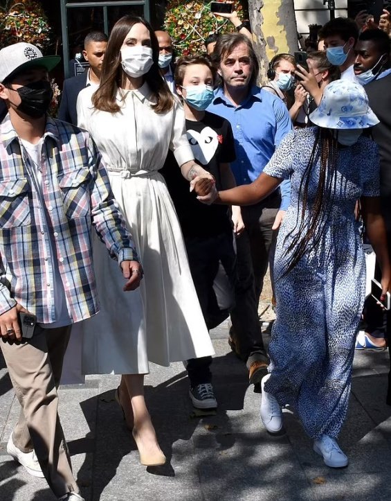 Angelina Jolie in several stylings with children in Paris