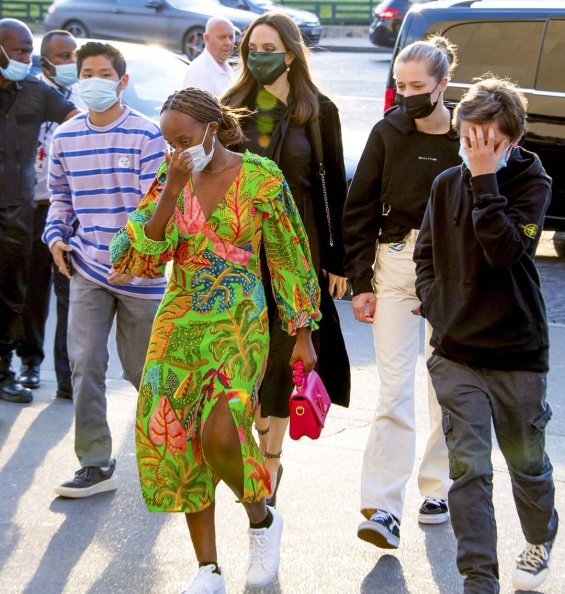 Angelina Jolie in several stylings with children in Paris