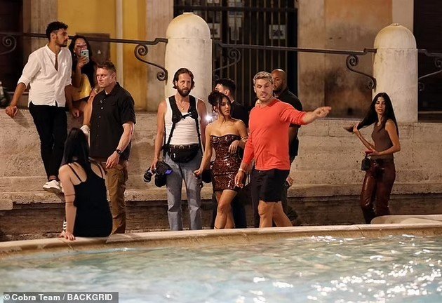 Kim Kardashian single and happy in Rome - Posing with fans in a provocative dress