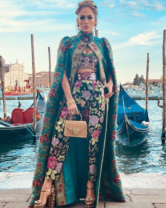 Jennifer Lopez in a floral outfit with a gown at the fashion show of Dolce & Gabbana in Venice