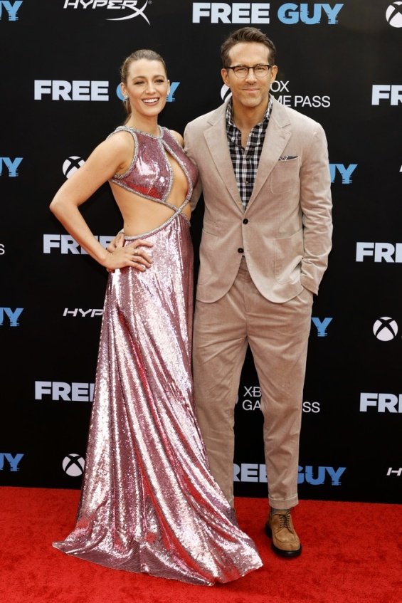 Couple in style: Blake Lively glamorous in a dazzling creation alongside Ryan Reynolds at the premiere