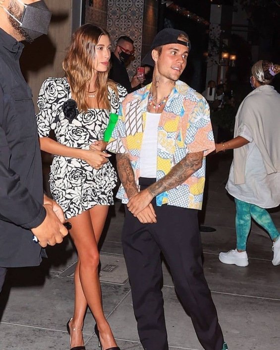 Hailey Bieber fashionable in a mini dress at a dinner with Justin in Beverly Hills