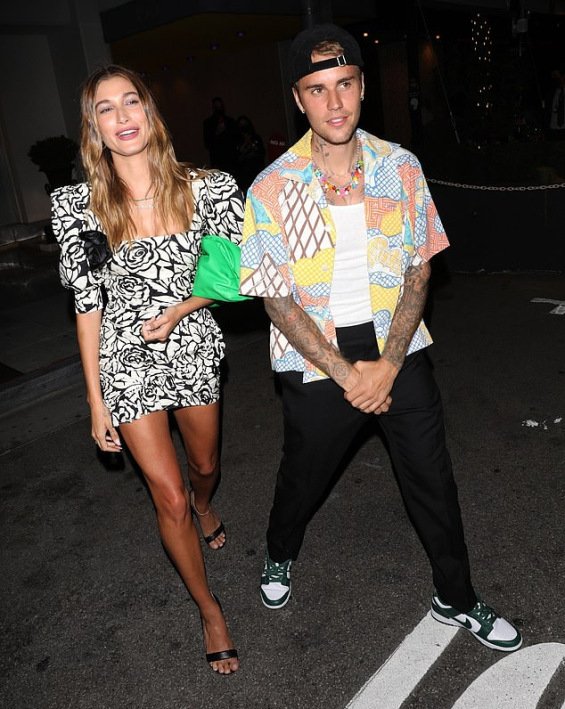 Hailey Bieber fashionable in a mini dress at a dinner with Justin in Beverly Hills