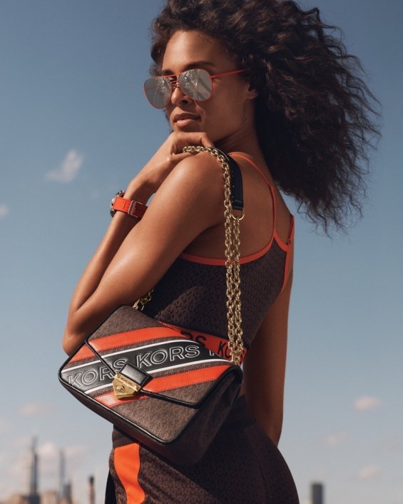 The dominance of brown and orange: Michael Kors's Autumn Campaign with Bella Hadid