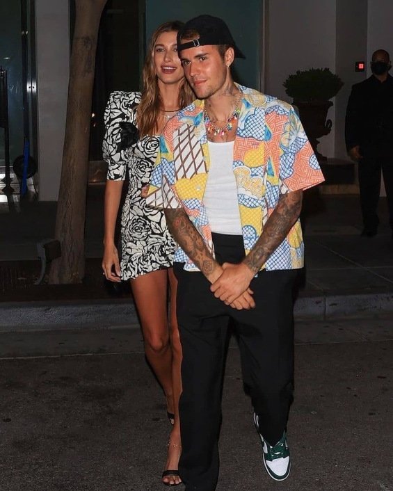 Hailey Bieber fashionable in a mini dress at a dinner with Justin in Beverly Hills