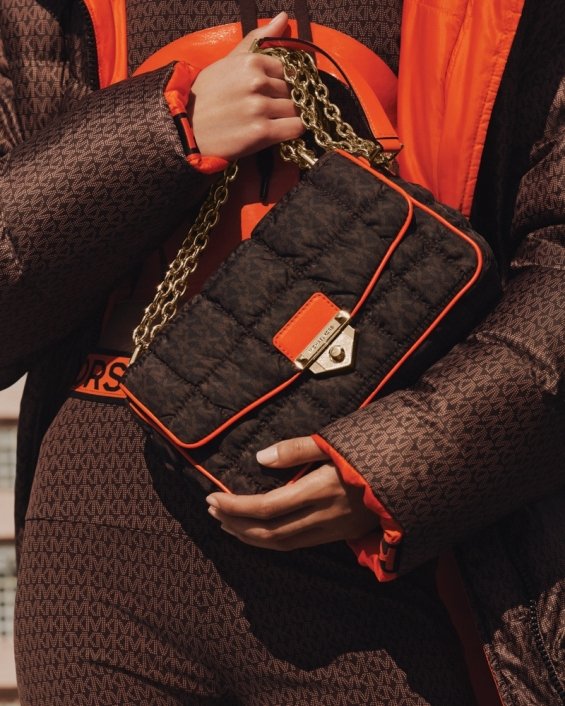 The dominance of brown and orange: Michael Kors's Autumn Campaign with Bella Hadid