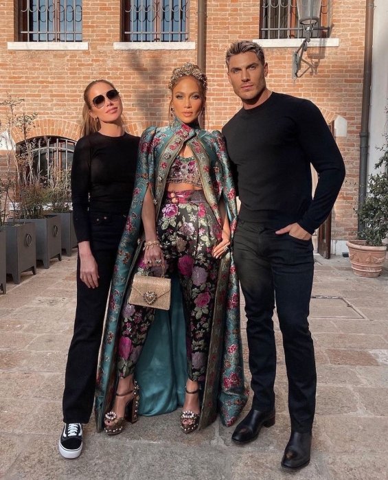 Jennifer Lopez in a floral outfit with a gown at the fashion show of Dolce & Gabbana in Venice