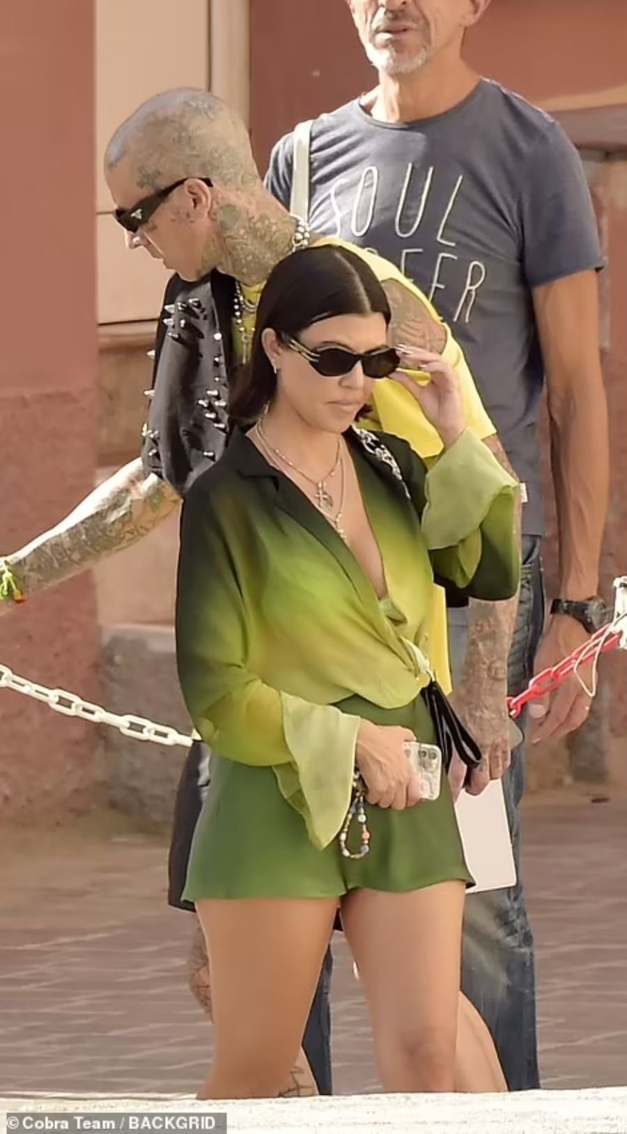 Kourtney Kardashian and Travis Barker on vacation in Italy - Passionate touches, bold poses