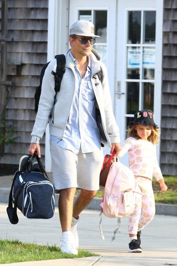 Irina Shayk enjoys the beach in Ibiza while Bradley Cooper takes care of their daughter