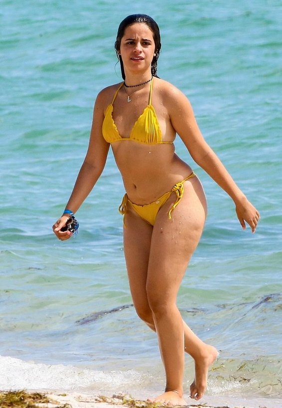 Camila Cabello in a yellow bikini enjoys the beach in Miami