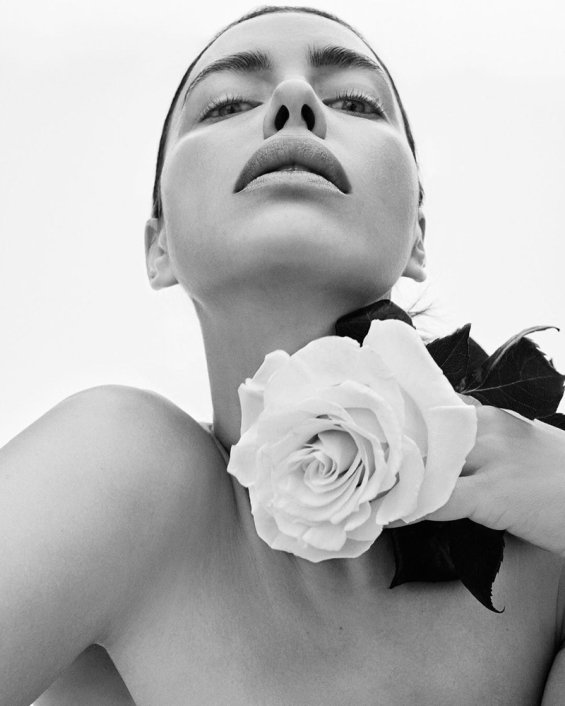 Irina Shayk poses with roses in the photo session for the new Replay collection