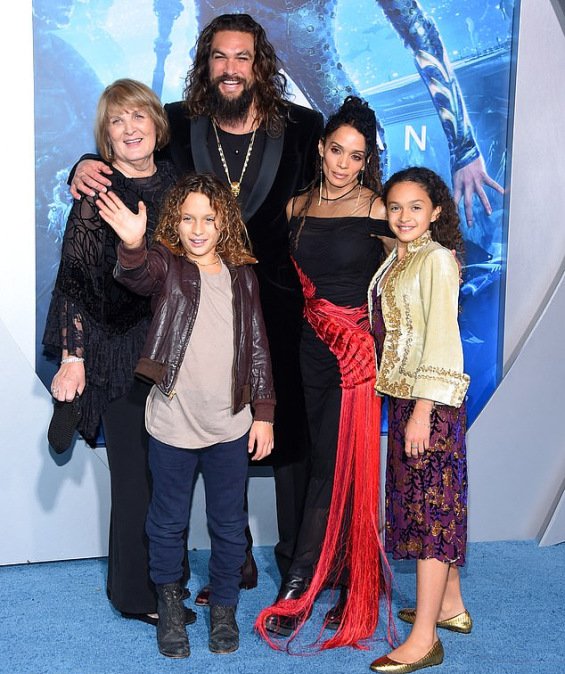 Jason Momoa with two children on the red carpet at the premiere of No Time To Die