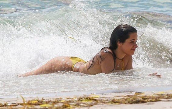 Camila Cabello in a yellow bikini enjoys the beach in Miami
