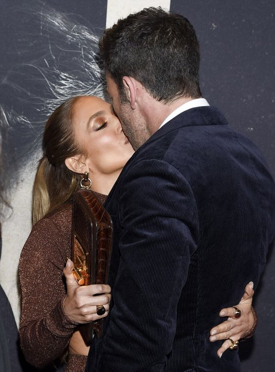 Couple in love: Jennifer Lopez bursts with happiness alongside Ben Affleck at the premiere of The Last Duel