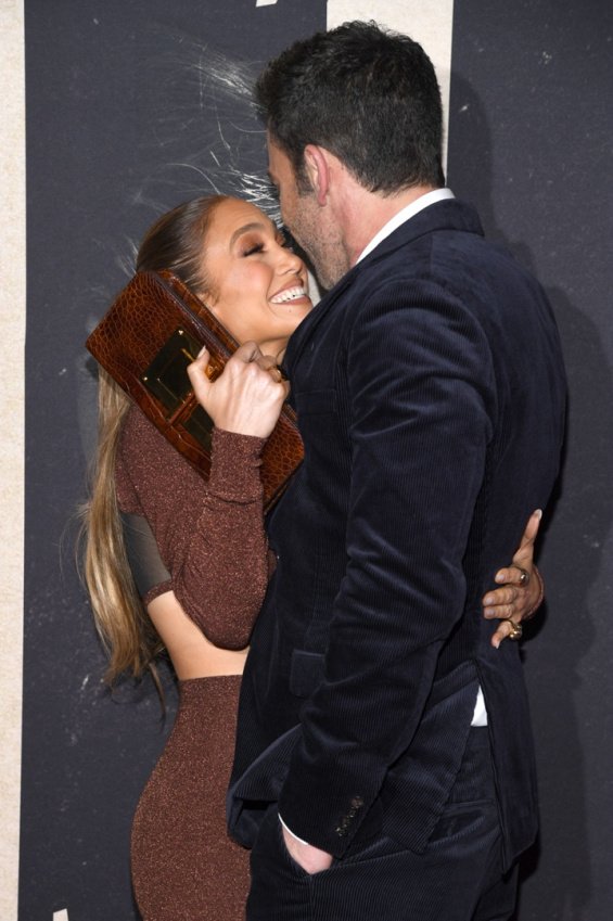 Couple in love: Jennifer Lopez bursts with happiness alongside Ben Affleck at the premiere of The Last Duel