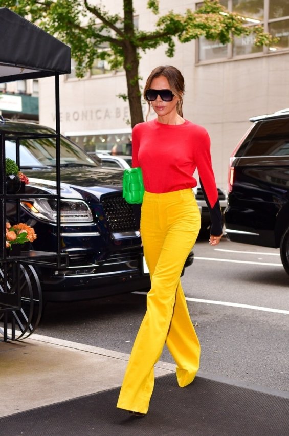 Victoria Beckham in colorful autumn styling with her signature