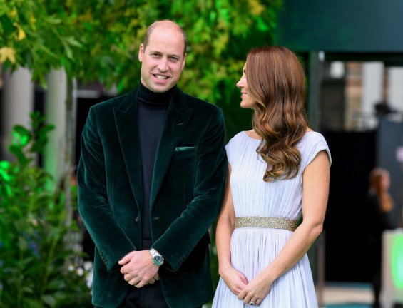 Duchess Catherine in a creation by Alexander McQueen with Prince William at an awards ceremony in London