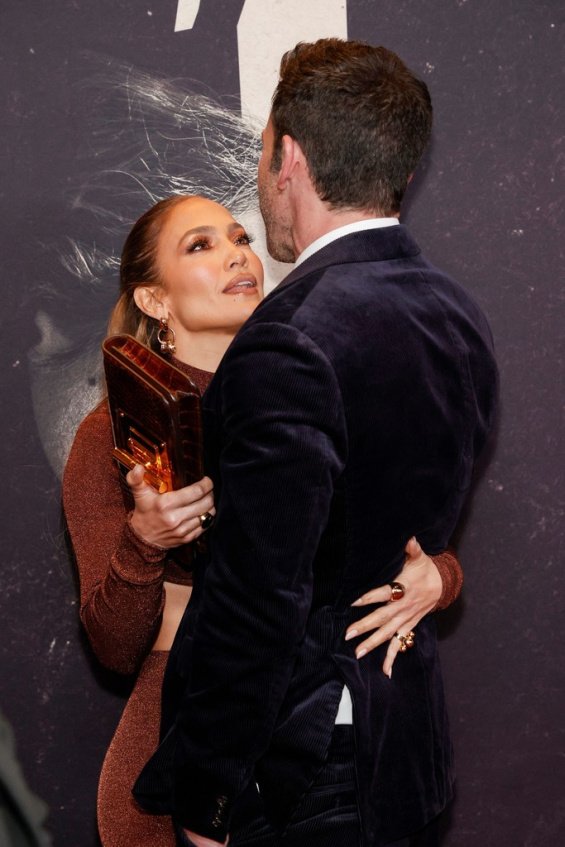 Couple in love: Jennifer Lopez bursts with happiness alongside Ben Affleck at the premiere of The Last Duel