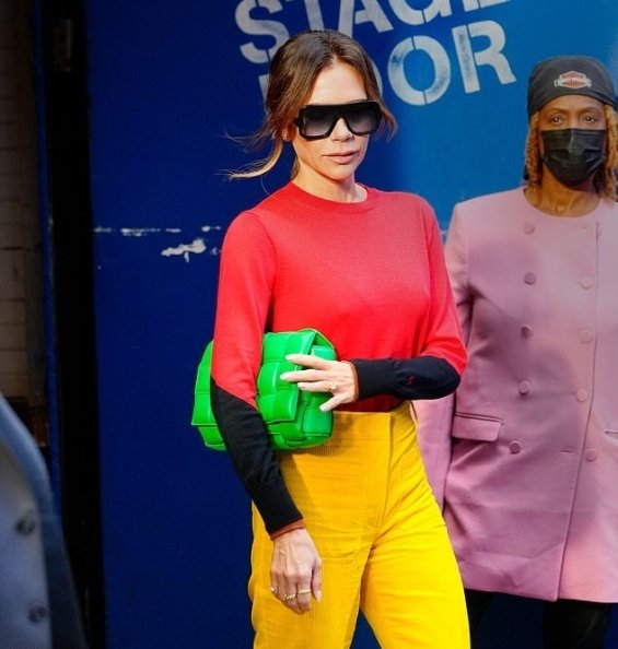 Victoria Beckham in colorful autumn styling with her signature