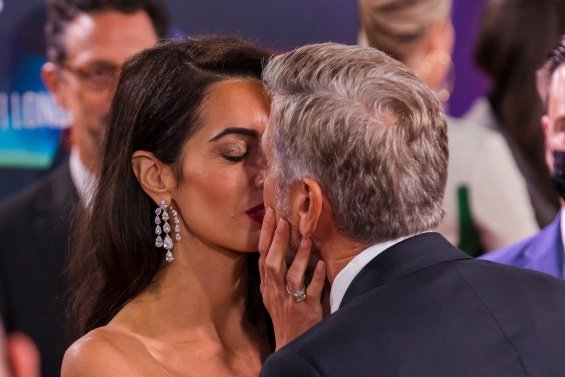 George and Amal Clooney glamorous couple on the red carpet in London