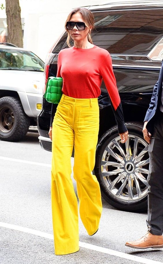 Victoria Beckham in colorful autumn styling with her signature