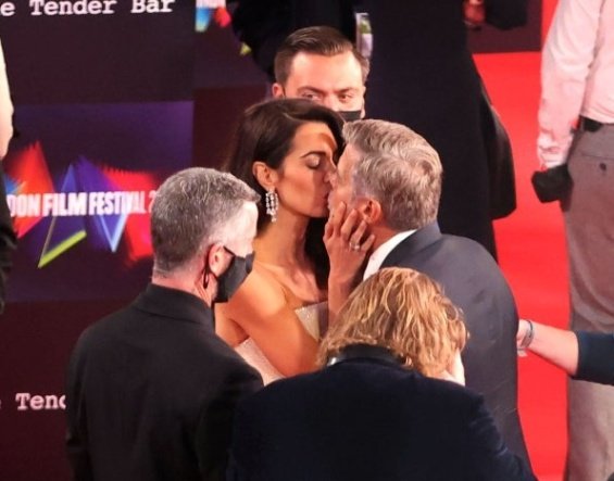 George and Amal Clooney glamorous couple on the red carpet in London