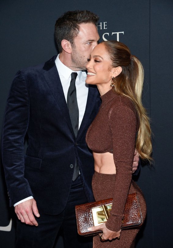 Couple in love: Jennifer Lopez bursts with happiness alongside Ben Affleck at the premiere of The Last Duel