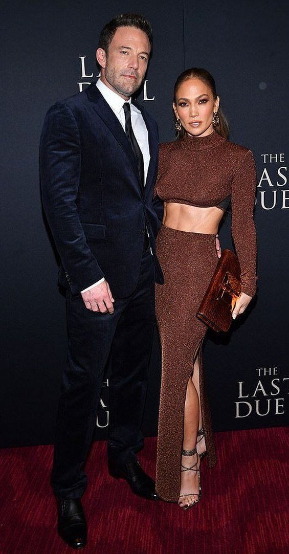 Couple in love: Jennifer Lopez bursts with happiness alongside Ben Affleck at the premiere of The Last Duel