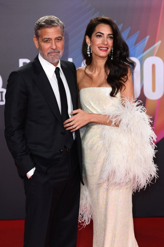 George and Amal Clooney glamorous couple on the red carpet in London