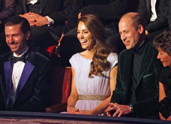 Duchess Catherine in a creation by Alexander McQueen with Prince William at an awards ceremony in London