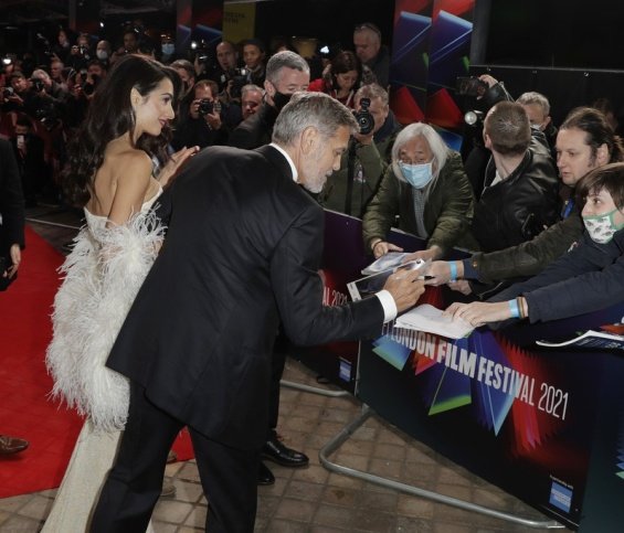 George and Amal Clooney glamorous couple on the red carpet in London